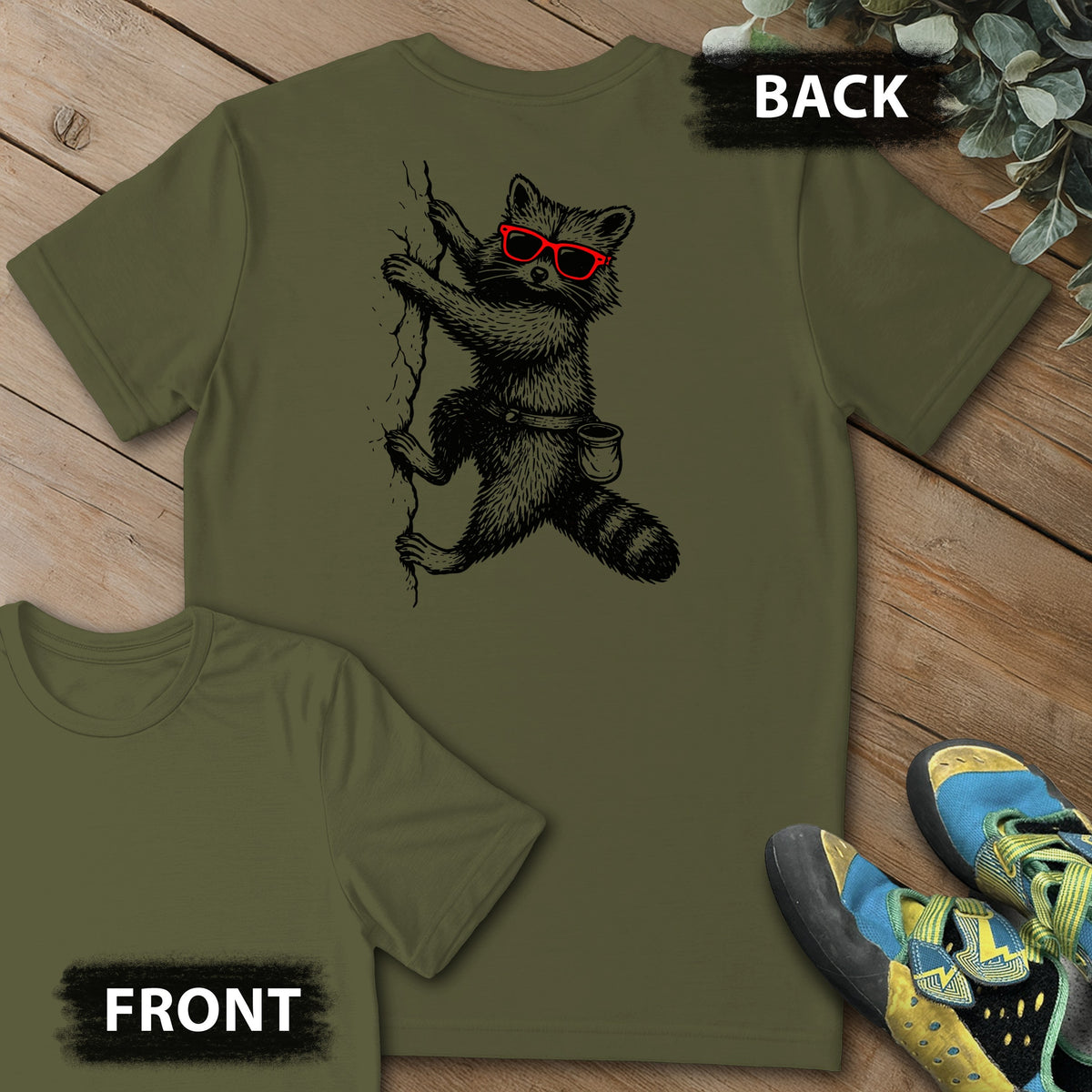 Raccoon Chillin Up a Cliff Backprint Tee in Military Green — flat lay mockup