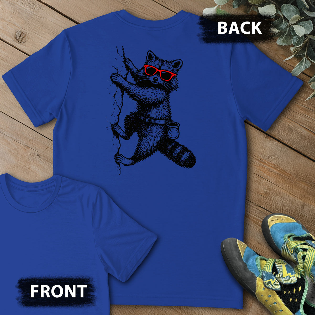Raccoon Chillin Up a Cliff Backprint Tee in Royal — flat lay mockup