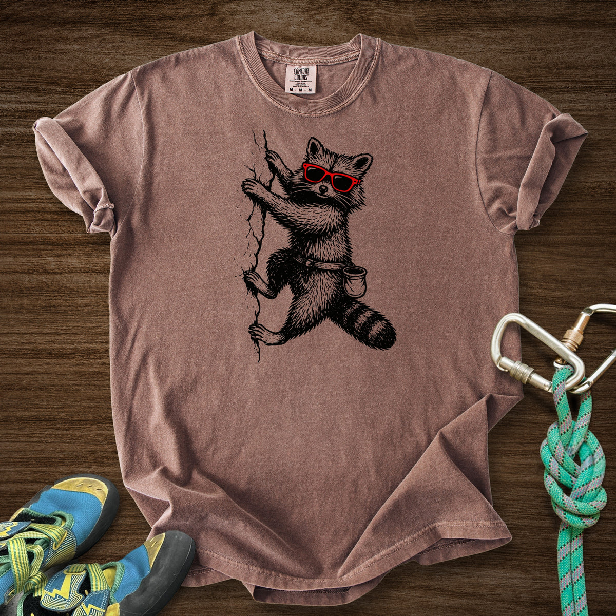 Raccoon Chillin Up a Cliff Premium in Espresso — flat lay mockup
