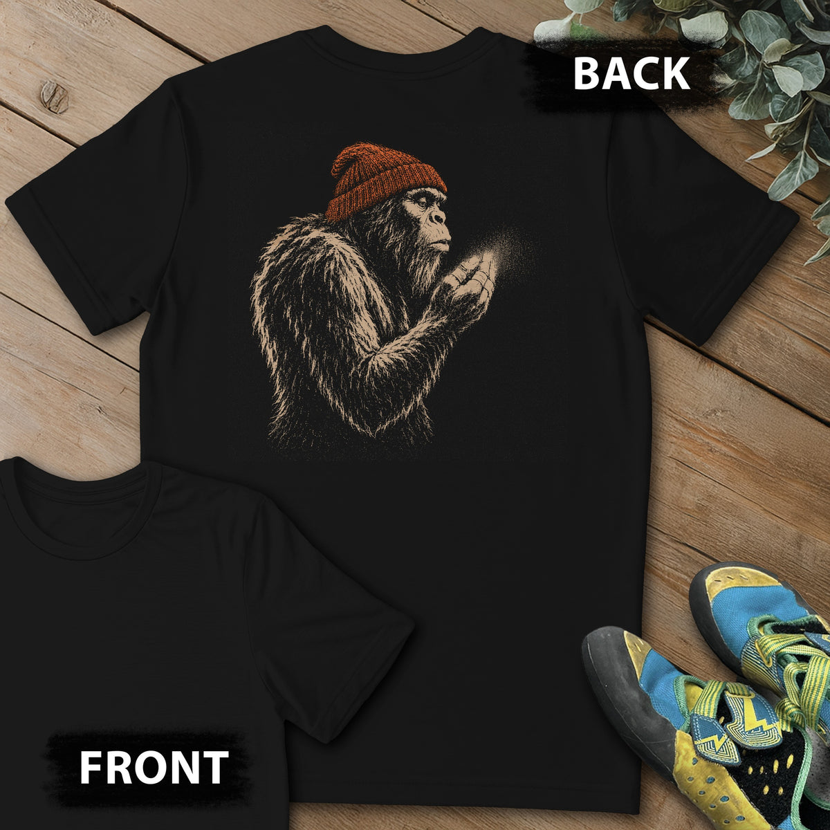 Sasquatch Blowing Chalk Beanie Backprint Tee in Black — flat lay mockup