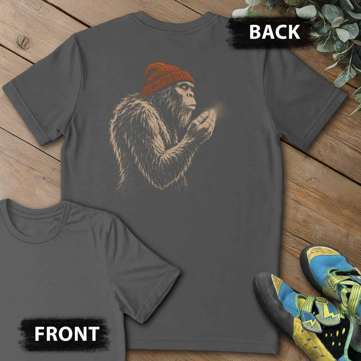 Sasquatch Blowing Chalk Beanie Backprint Tee in Charcoal — flat lay mockup