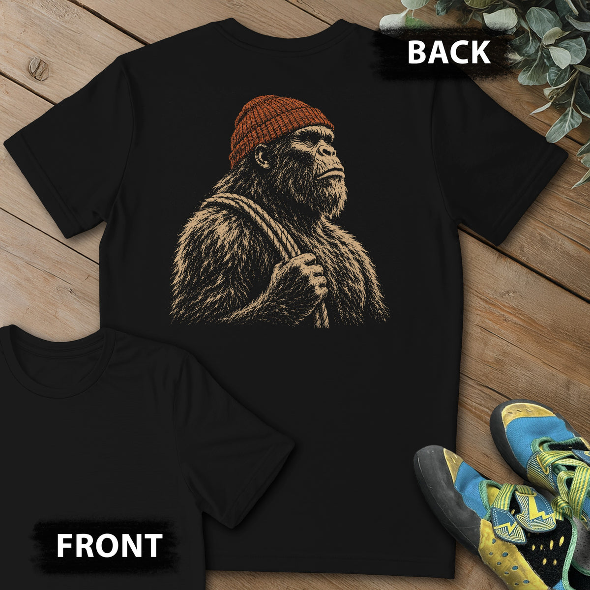 Sasquatch Reading Beta Beanie Backprint Tee in Black — flat lay mockup