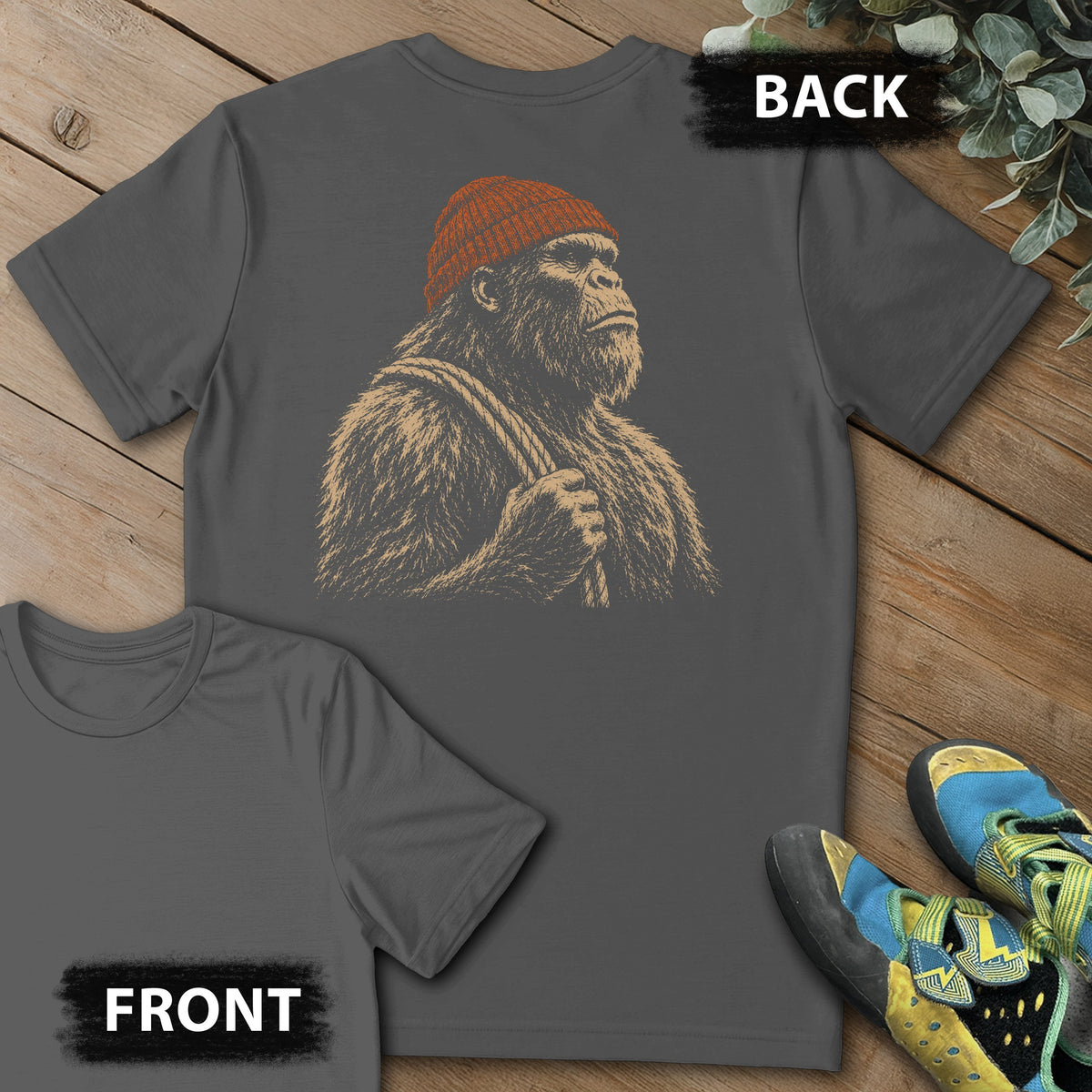 Sasquatch Reading Beta Beanie Backprint Tee in Charcoal — flat lay mockup